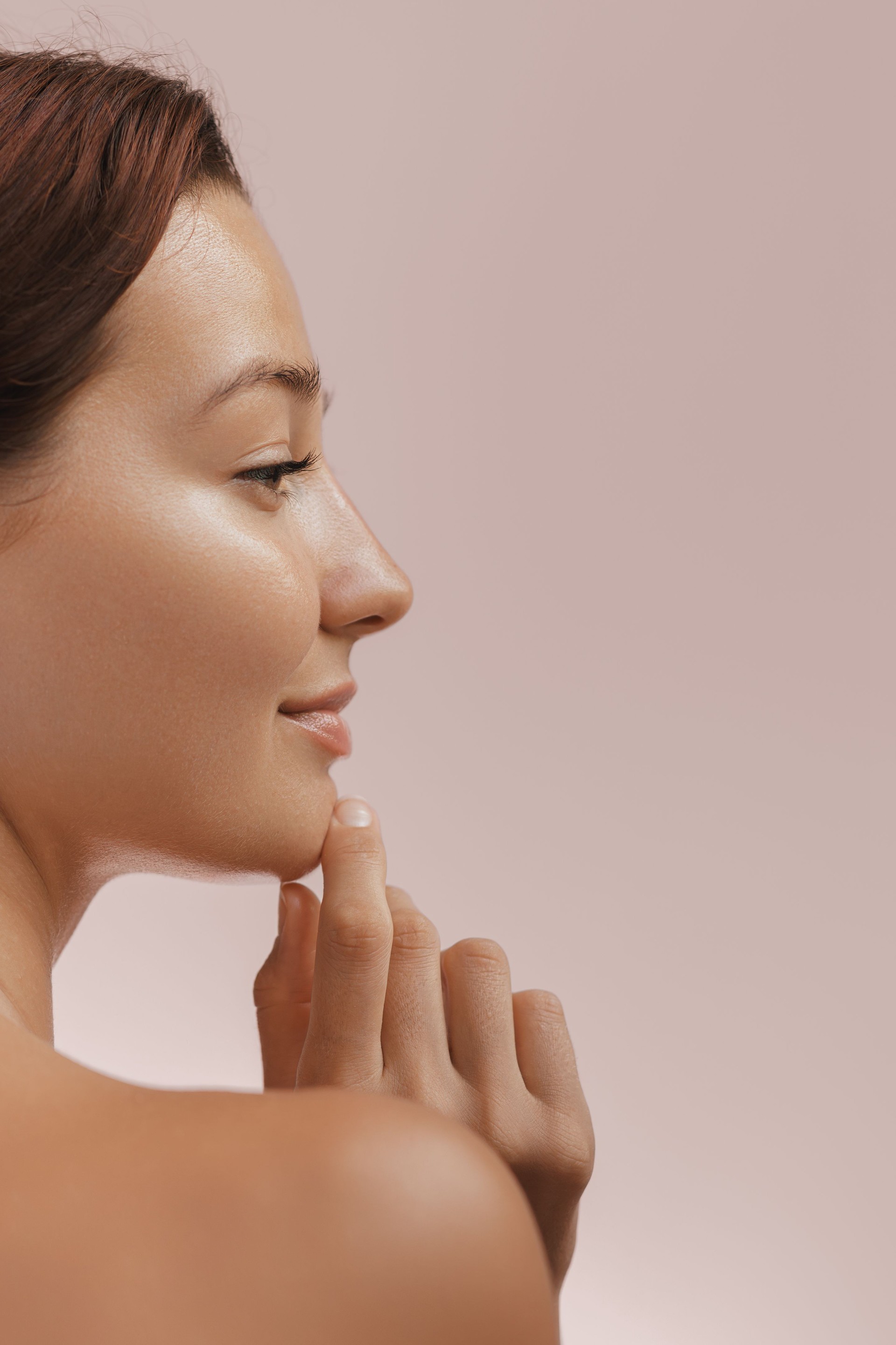 Skin Care and Beauty Concept Photo of Woman with Clean and Healthy Skin Touching Her Face
